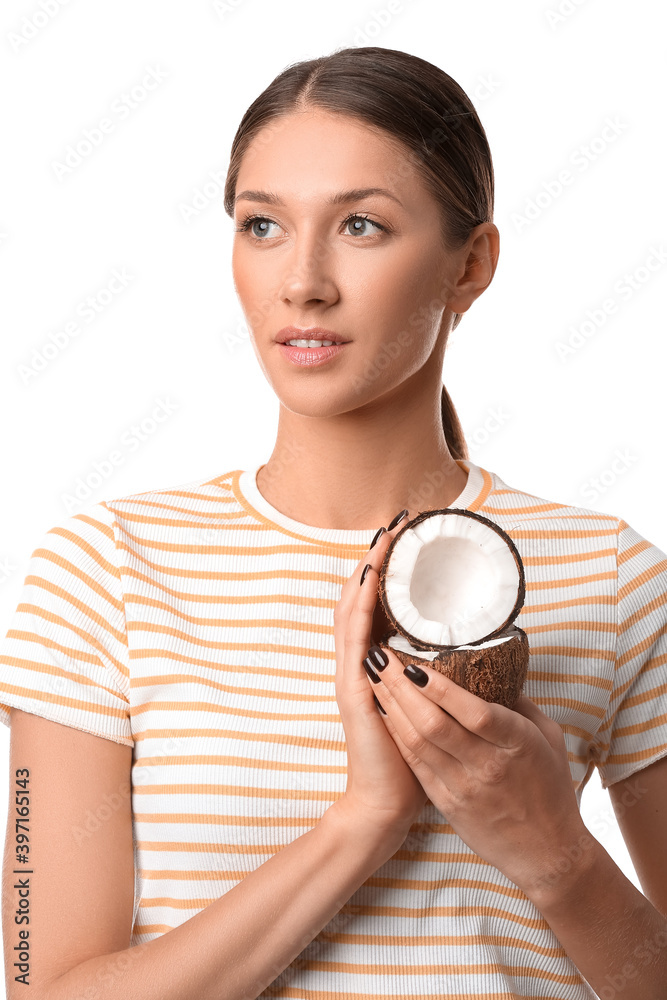 Beautiful young woman with coconut on white background Beautiful young woman with coconut on white background