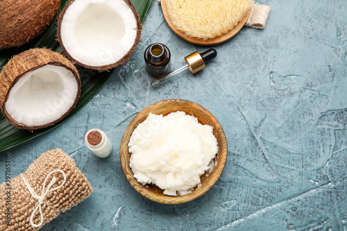 Composition with coconut oil and cosmetics on grey background