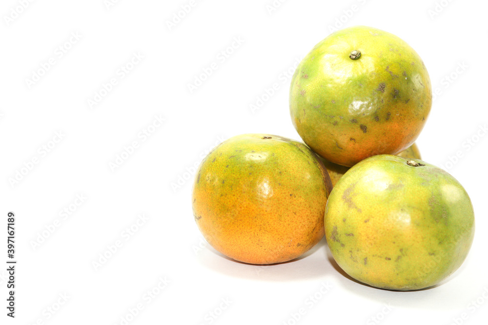 Thailand tangerine on a white background with high vitamin C, suitable for eating, playing and making fruit smoothies for health and body care. Thailand tangerine on a white background with high vitamin C, suitable for eating, playing and making fruit smoothies for health and body care.