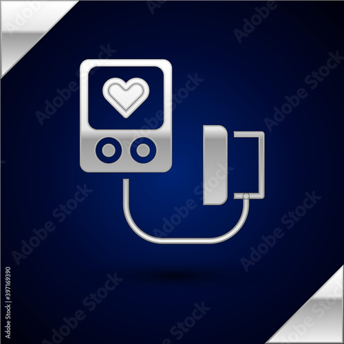 Silver Blood pressure icon isolated on dark blue background. Vector.