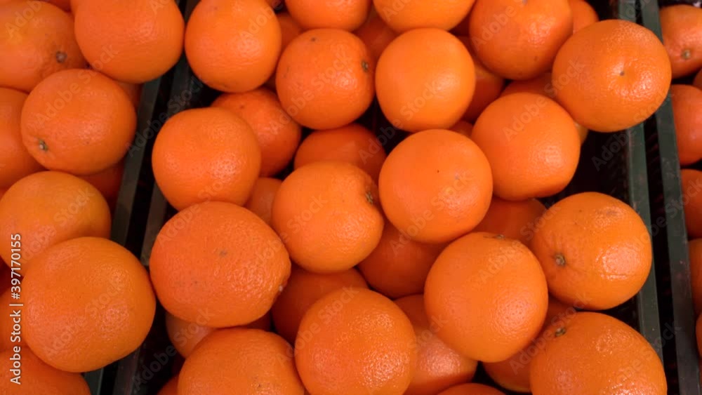 Fresh oranges for sale in local market. Agriculture and fruits product.