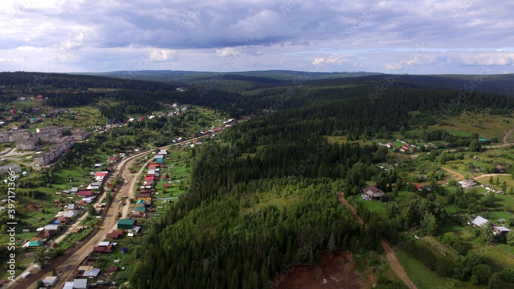 A small town of Nizhniye Earrings Sverdlovsk region from a bird's eye view shooting from a quadrocopter