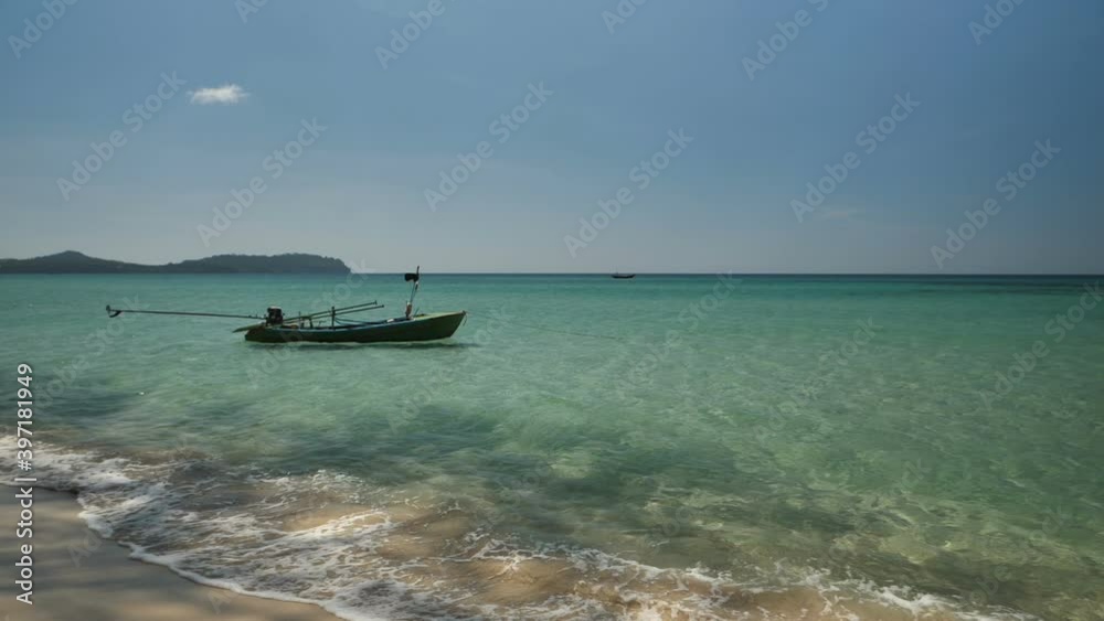 fisherman boat on a beautiful beach in Thailand fisherman boat on a beautiful beach in Thailand