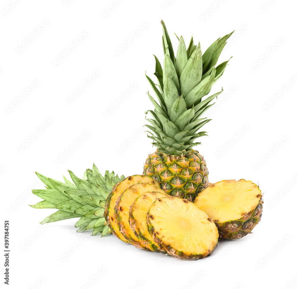 Whole and cut juicy pineapples isolated on white Whole and cut juicy pineapples isolated on white