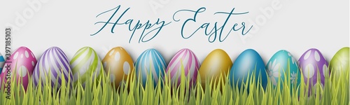 Happy Easter holiday banner or newsletter header. Colorful eggs in grass. Vector illustration with lettering.