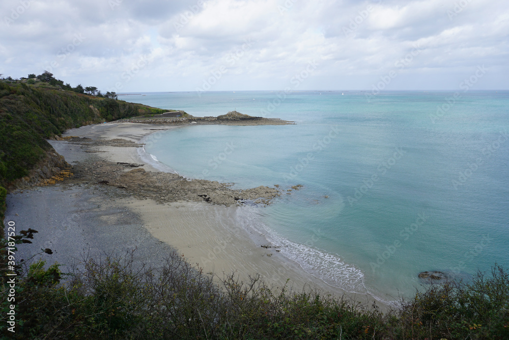 panoramic view of the sandy beach  along the rocky coast of Brittany, France
