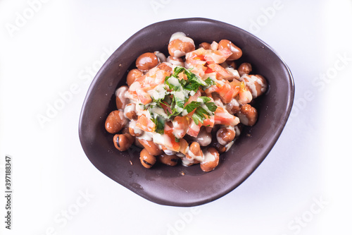 foul or ful Modammas Fava Beans Traditional Dish of Beans for all arab - White background 
 photo