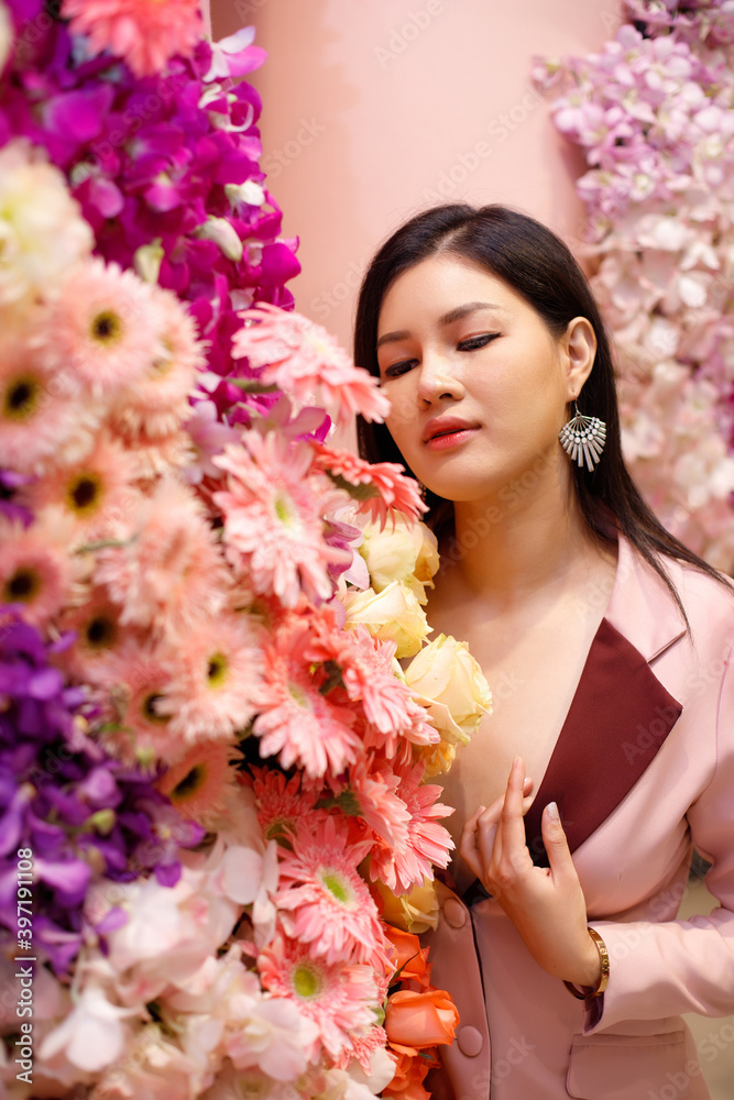Business Woman feel happy in flowers garden field Business Woman feel happy in flowers garden field