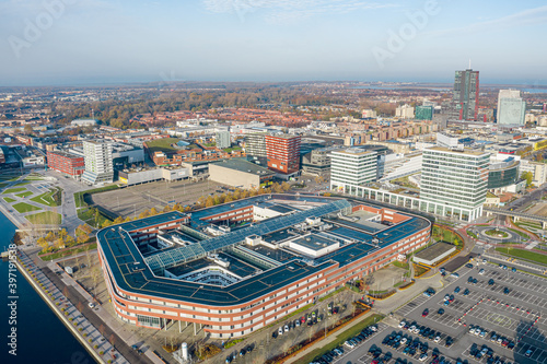 Almere, Netherlands city center with the hospital building on the foreground. Aerial view. 