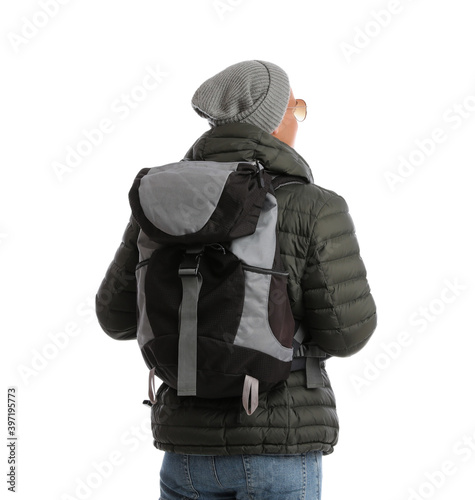 Man with backpack on white background, back view. Winter travel