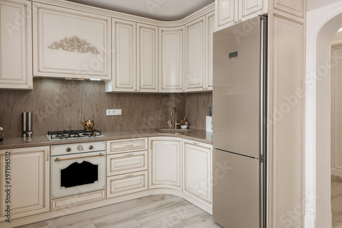 Beige kitchen in a modern classic
