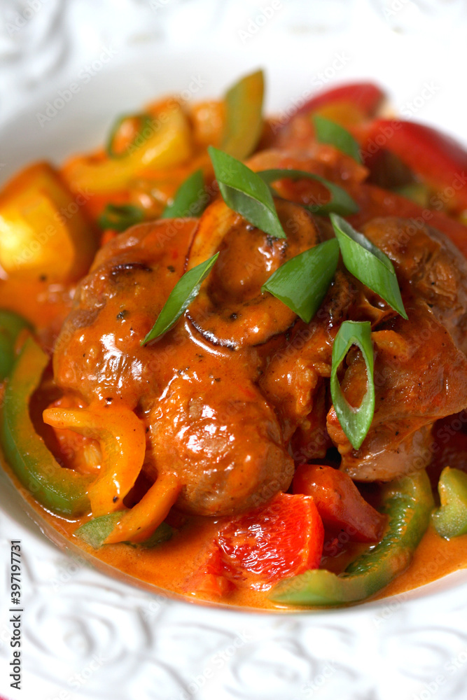 Osso buco alla milanese mit Paprika und Tomaten Stock Photo Adobe Stock