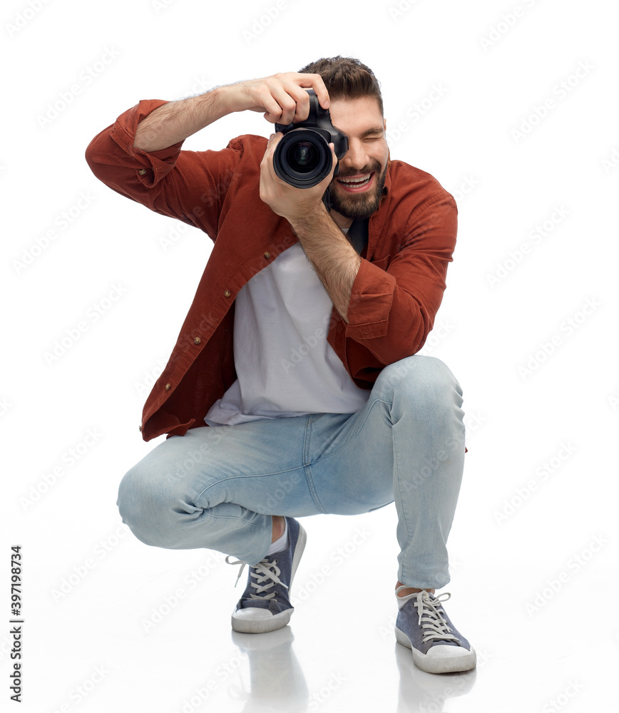 photography, profession and people and concept - happy smiling man or photographer with digital camera over white background photography, profession and people and concept - happy smiling man or photographer with digital camera over white background