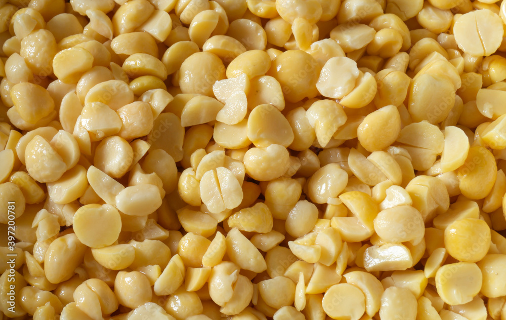 Yellow peas in a textured bag. half, Products of the feeding close-up Yellow peas in a textured bag. half, Products of the feeding close-up