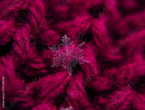 Snowflake beautifull on the colorful background macro