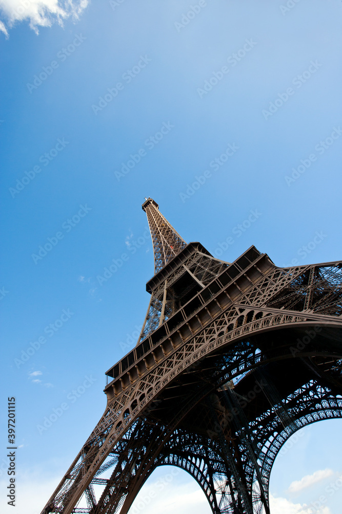 Close-Up view looking up at the Eiffel Tower in Paris, France - obrazy, fototapety, plakaty 
