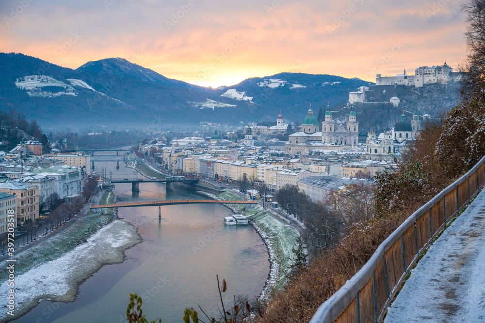 snowy sunrise on wintermorning before christmas in salzburg city - panorama