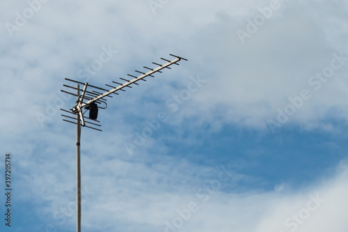 Digital television antenna on the blue sky on a sunny day