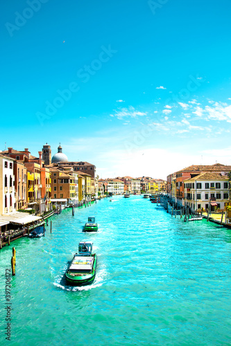 Sunny and beautiful Venice. Old colorful buildings, narrow streets and bridges. Monuments of Venice in Italy 