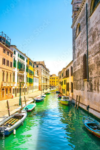 Sunny and beautiful Venice. Old colorful buildings  narrow streets and bridges. Monuments of Venice in Italy 