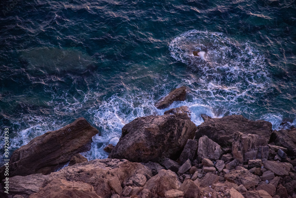 Greece Cape Sounio. The sea splashes the rocks on the shore. Shot before sunset.
Tourist landmark of Attica, Sounion, Greece