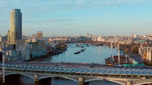 Cinematic aerial drone shot of blackfriars bridge towards London Eye and Houes of parliment London photo