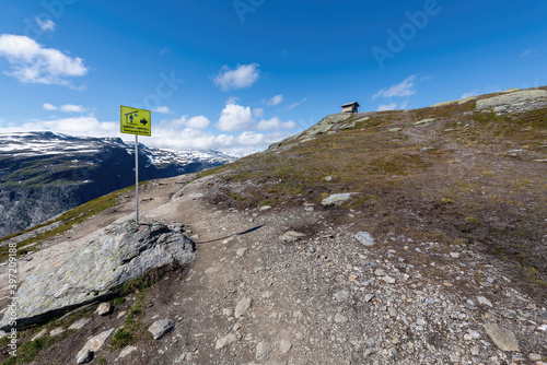 A sign pointing to a survival cabin, close to Trolltunga in Norway. 