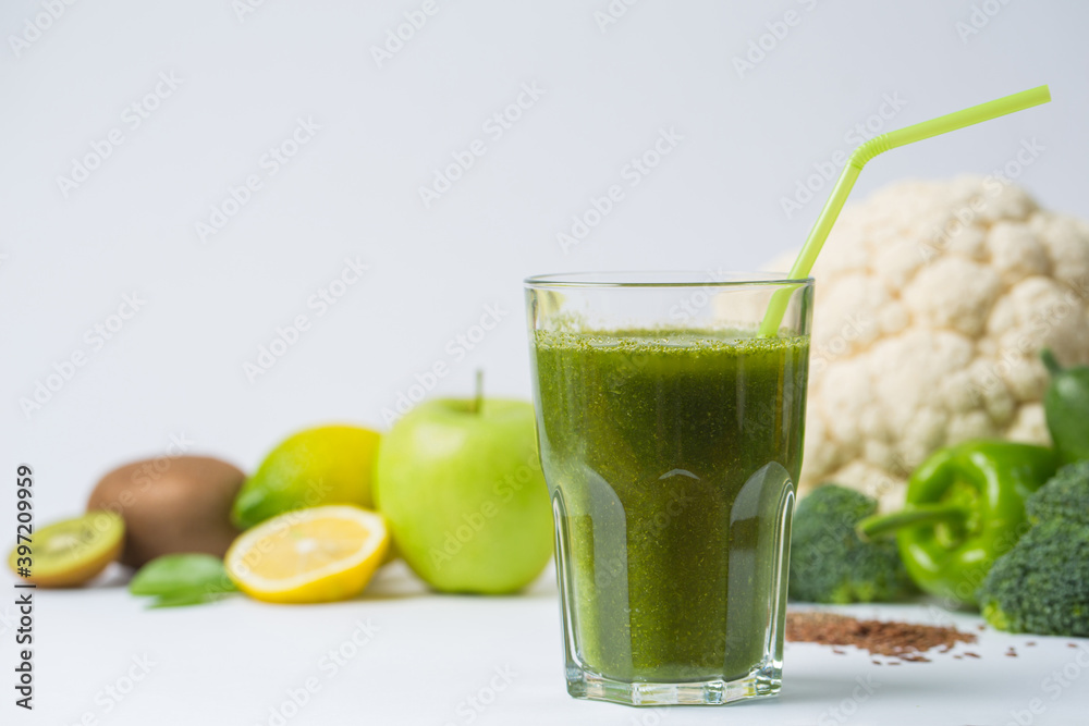 Detox cocktail from raw green fruits and vegetables and lettuce and parsley Detox cocktail from raw green fruits and vegetables and lettuce and parsley