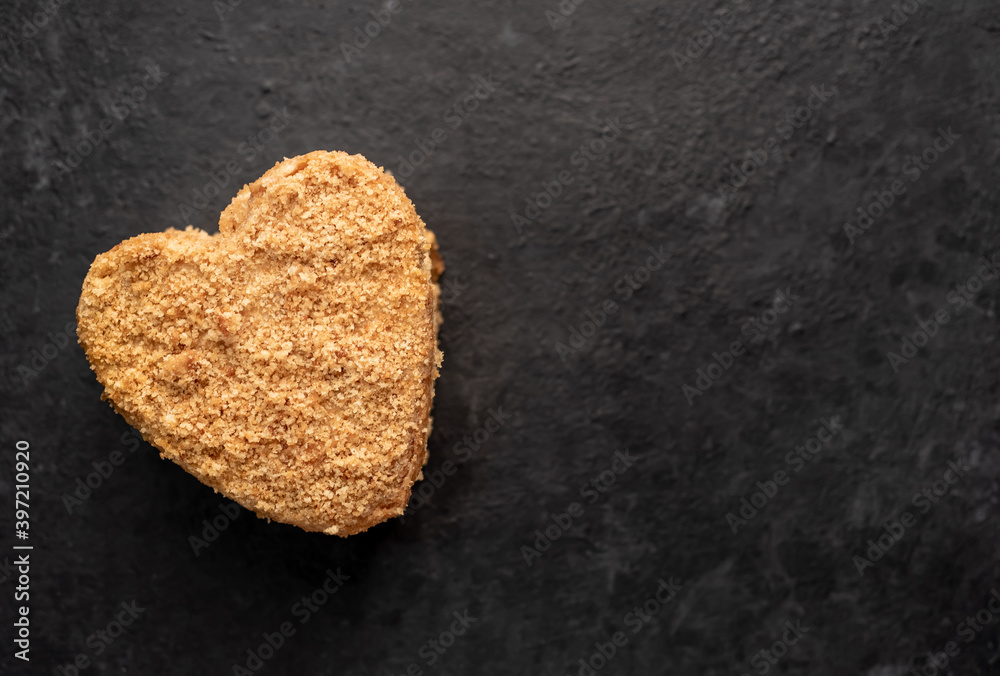Obraz premium heart shaped cake on stone background