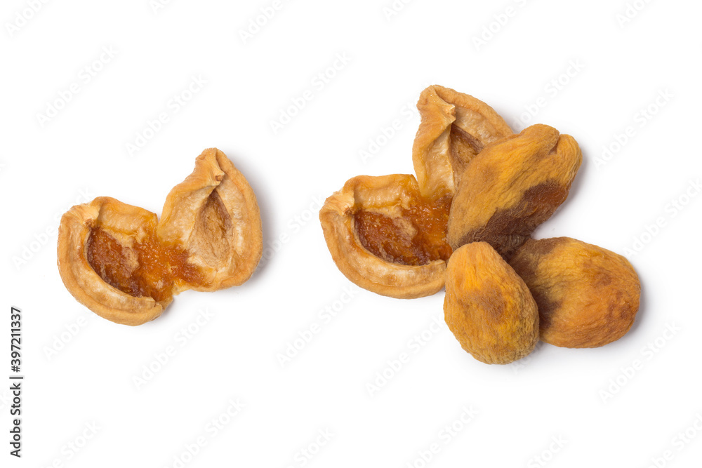 Dried apricots isolated on white in studio Dried apricots isolated on white in studio