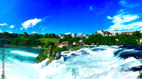 Wonderful Switzerland waterfall in hot summer day