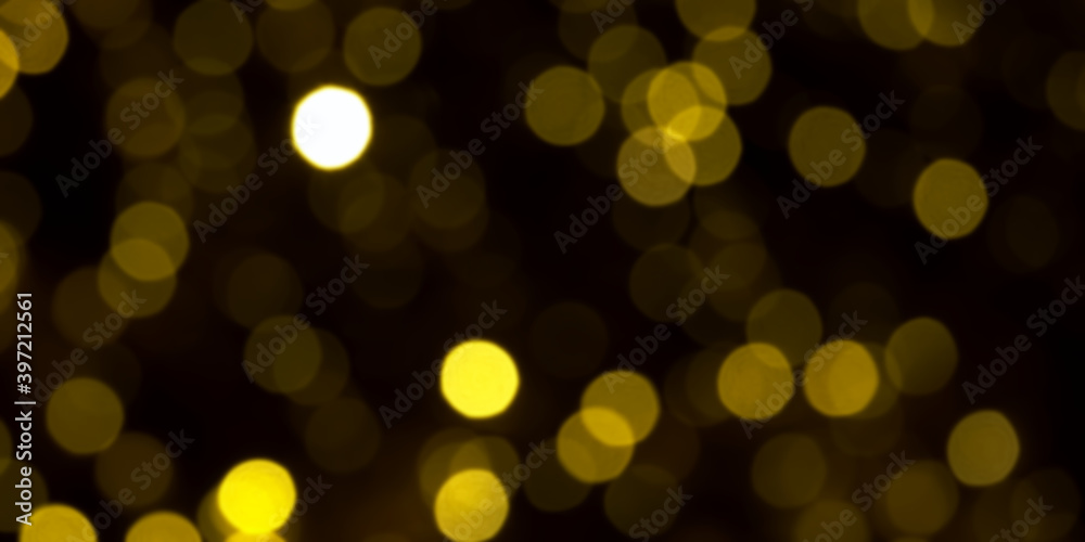 defocused gold christmas lights on dark background. yellow bokeh circles on black backdrop, christmas background