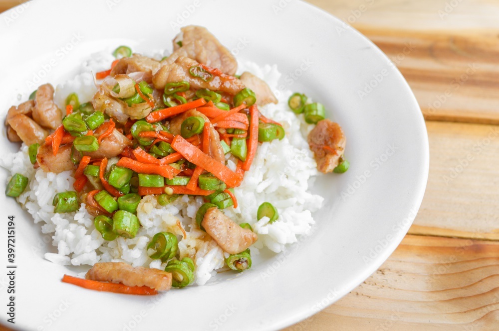 pork and vegetable fried on hot rice - Thailand healthy food pork and vegetable fried on hot rice - Thailand healthy food