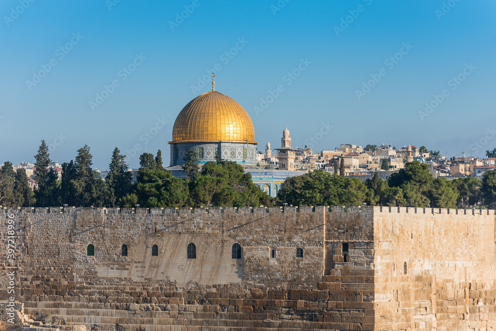 Golden Dome of the Rock on Temple Mount and wall of Old City of Jerusalem, view from Olive mount in Jerusalem Israel.