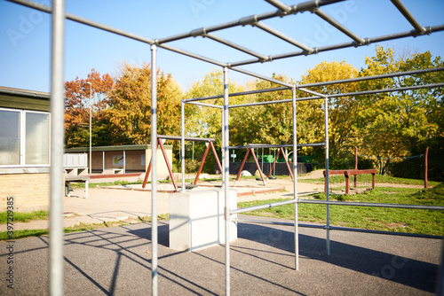 Playground with swings and metal bars