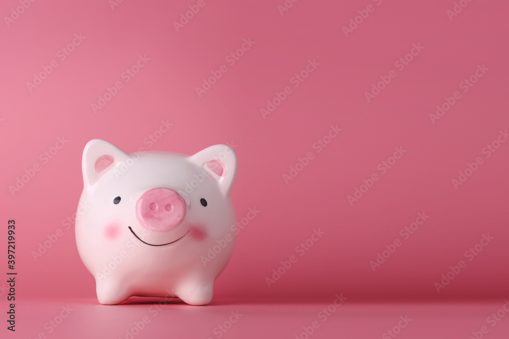 Pink piggy bank on isolated and pink background studio, meaning of saving or earning money or business investment for advertising concept.