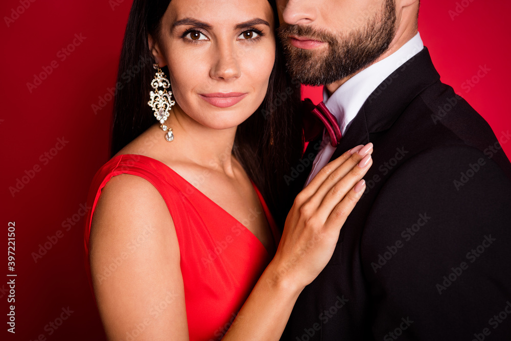Cropped photo of optimistic couple dance wear suit dress isolated on red color background
