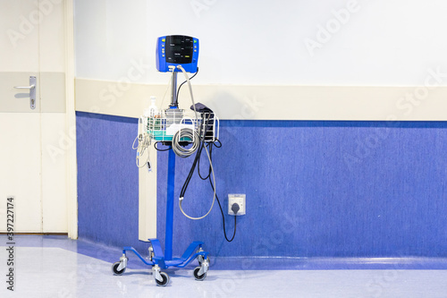 Mobile health diagnostic machine to check blood pressure and pulse at hospital ward corridor