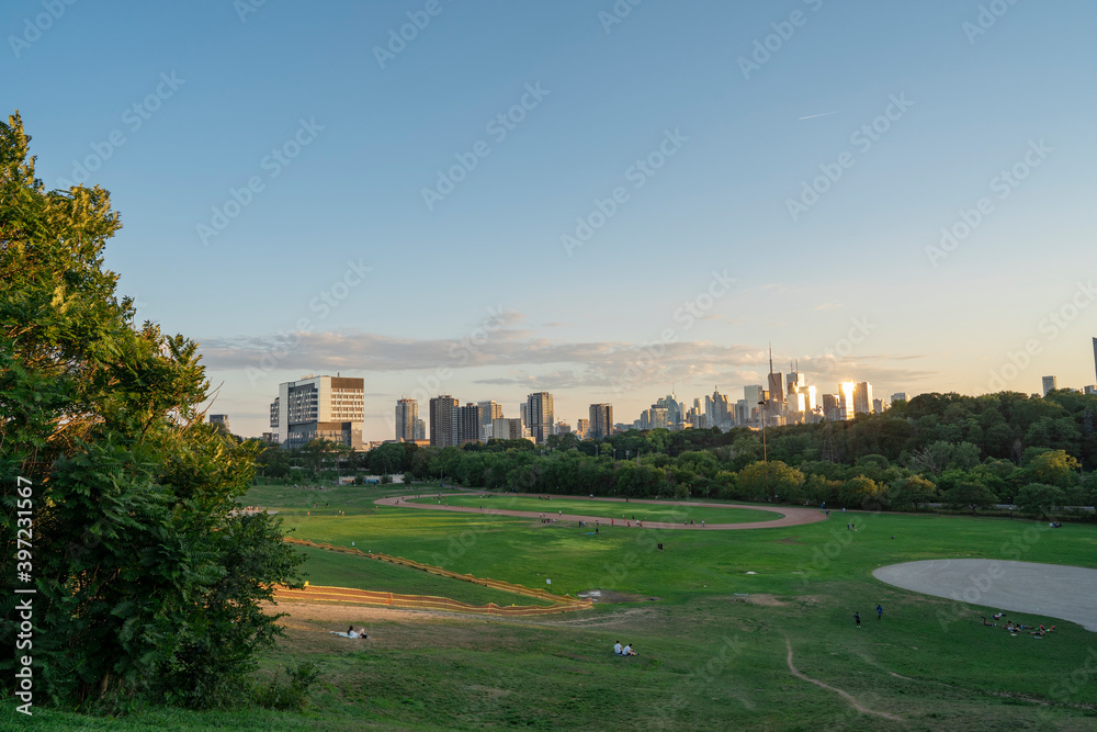 Toronto City Skyline on a sunny day from Riverdale Park in Ontario Canada