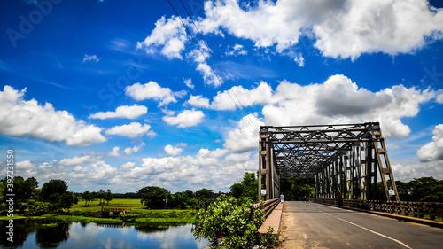 bridge over the river ,blue sky , white cloud