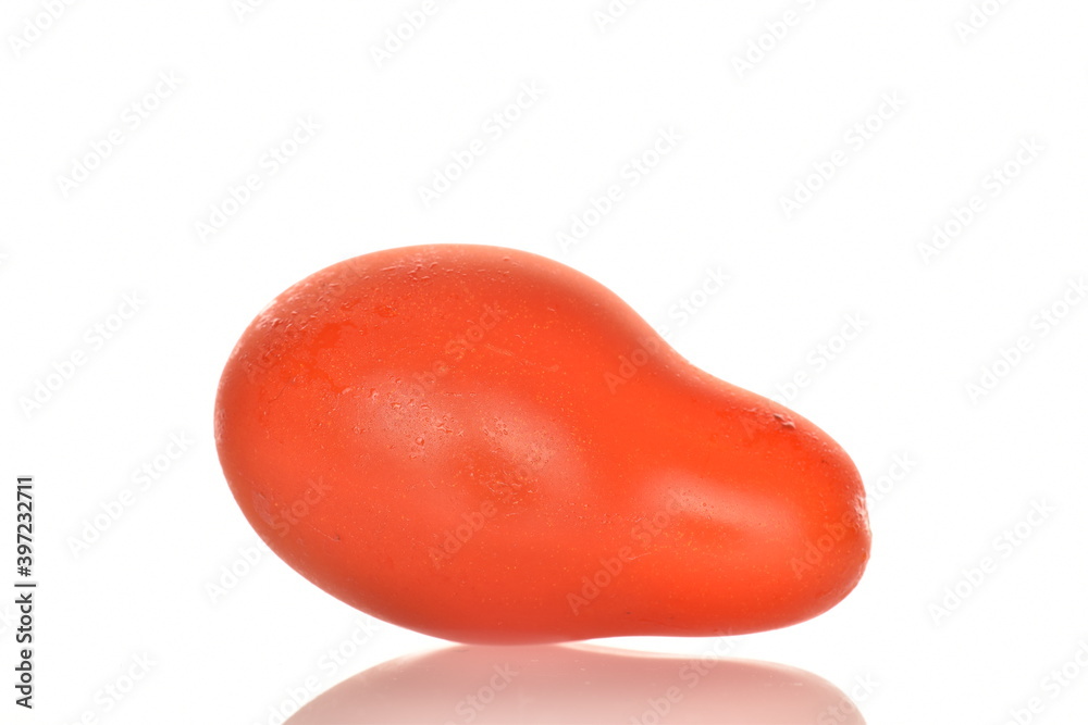 Fresh bright red tomatoes in the shape of a strawberry, close-up, isolated on white. Fresh bright red tomatoes in the shape of a strawberry, close-up, isolated on white.