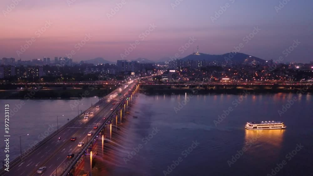 Aerial view Rainbow fountain show at Banpo bridge in Seoul, South Korea. Aerial view Rainbow fountain show at Banpo bridge in Seoul, South Korea.