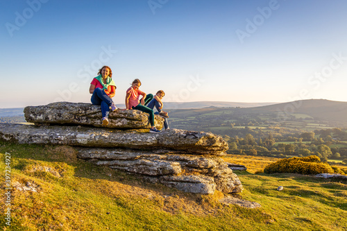 Family in Dartmoor national park in the evening