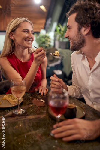 Cheerful couple on a dinner together