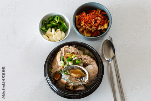 Ginseng chicken soup with abalone which is called Jeonbok Samgyetang