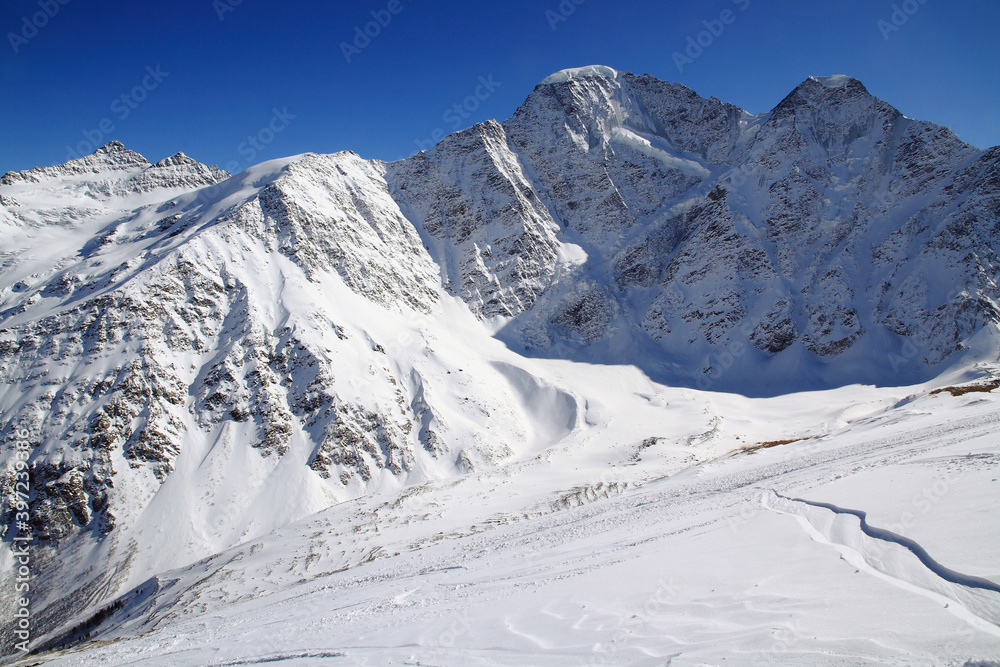 The peaks Kogutai, Donguz-Orun and Nakra from the southern slope of Mount Cheget, Prielbrusye, Caucasus