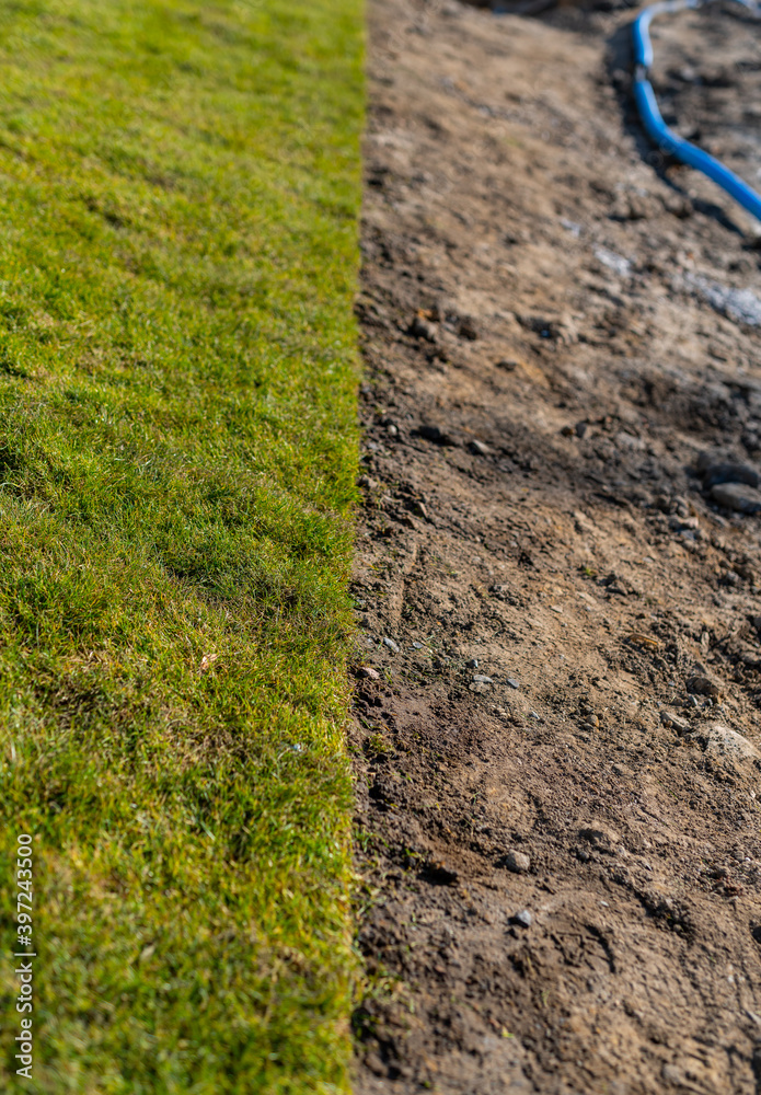 grass from the roll - lawn - gardener's job