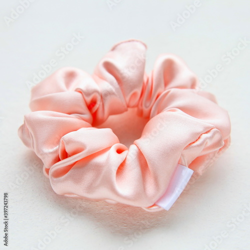 pink silk Scrunchy isolated on white background. Hairdressing tool of Colorful Elastic Hair Band, Bobble Scrunchie Hairband. square image