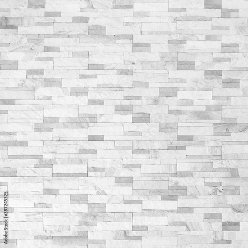 Sandstone wall background of white sand stone jigsaw tile, rock brick modern texture pattern for backdrop decoration
