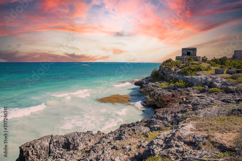 Sunset at the sea next to the Mayan temples of Tulum in Mexico